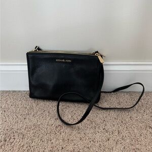 Barely used black Michael Kors purse.